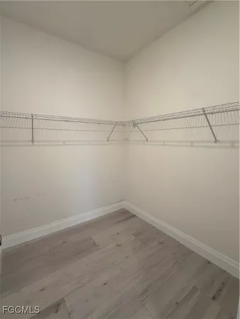 a view of a room with racks on the wall