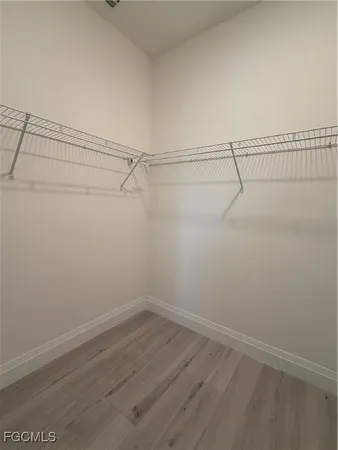 a view of a room with racks on the wall