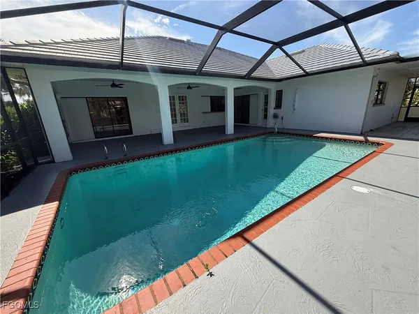 a view of a backyard with a patio