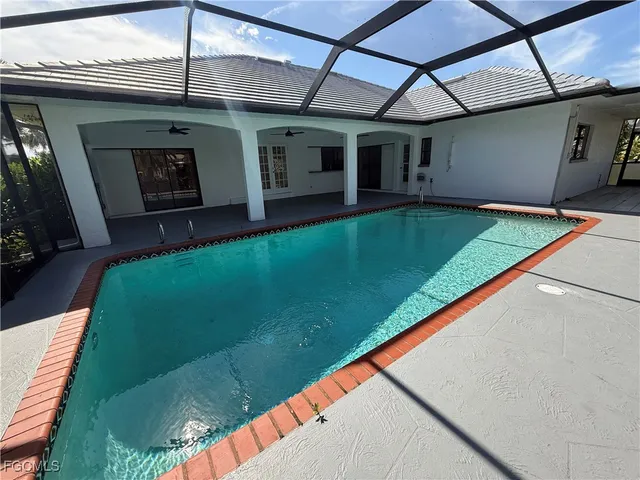 a view of a backyard with a patio