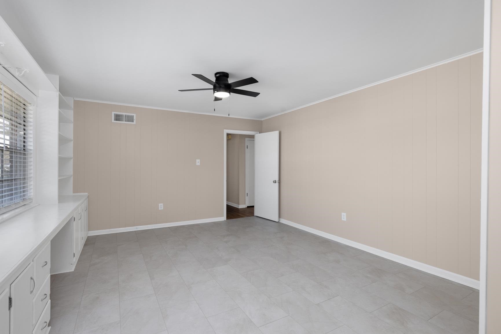 7223 Renda Street Millington, TN 38053 - Photo 11 of 24 a view of an empty room with a window