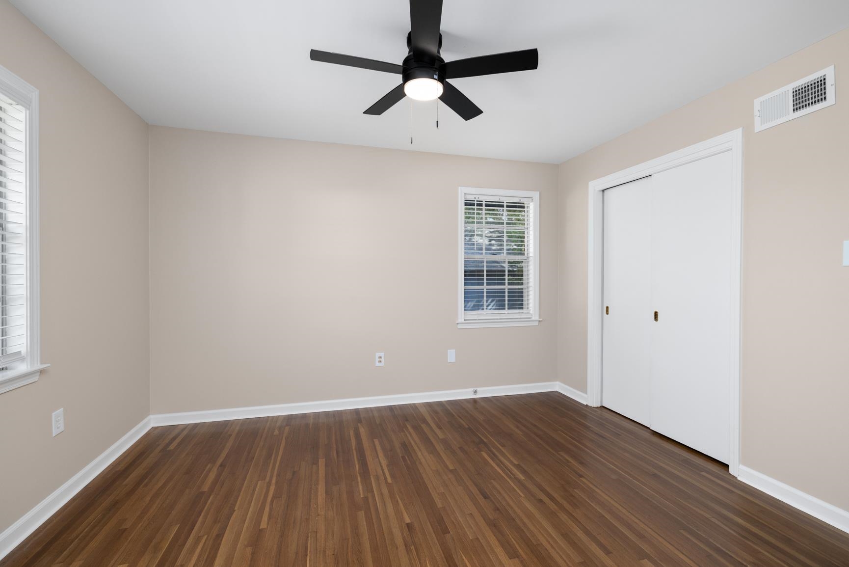 7223 Renda Street Millington, TN 38053 - Photo 14 of 24 a view of room with window wooden floor and ceiling fan