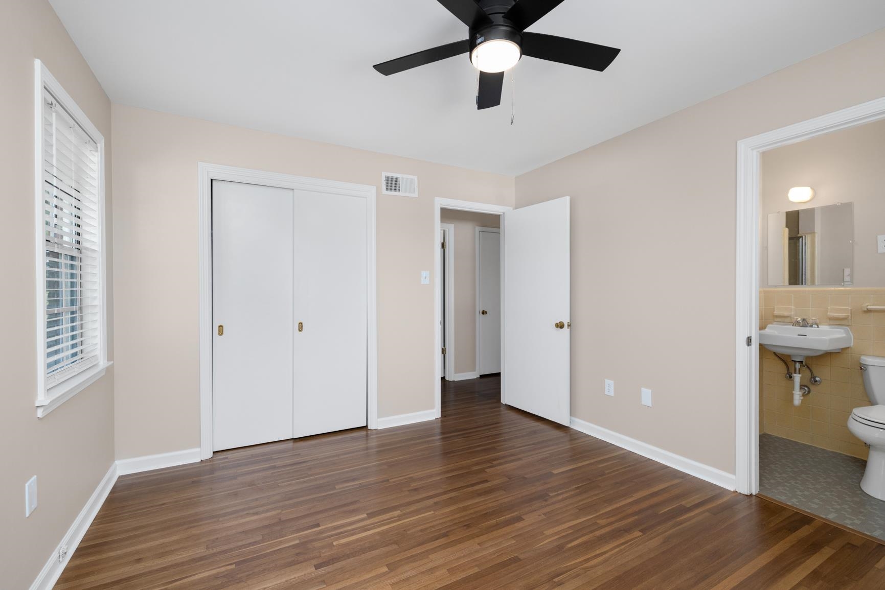 7223 Renda Street Millington, TN 38053 - Photo 15 of 24 wooden floor in an empty room with a window