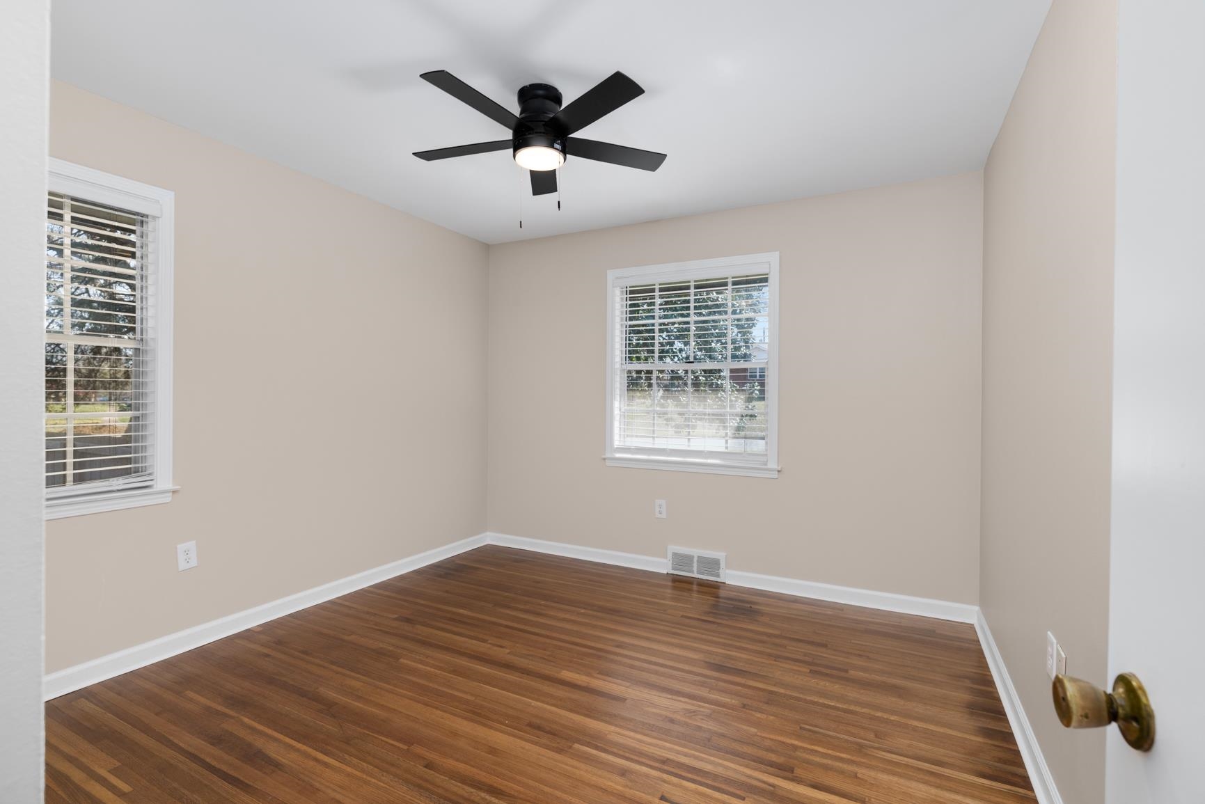 7223 Renda Street Millington, TN 38053 - Photo 19 of 24 wooden floor in an empty room with a window