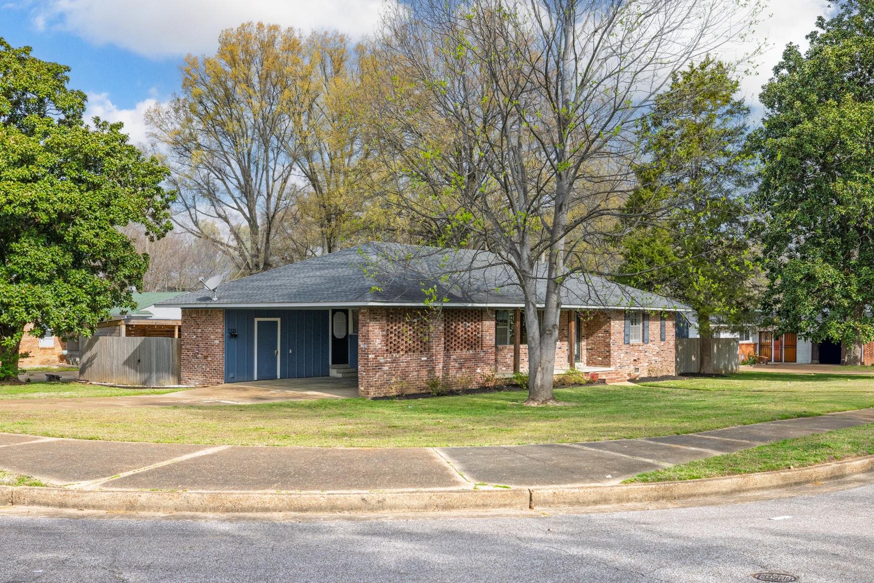 7223 Renda Street Millington, TN 38053 - Photo 2 of 24 a front view of building with yard