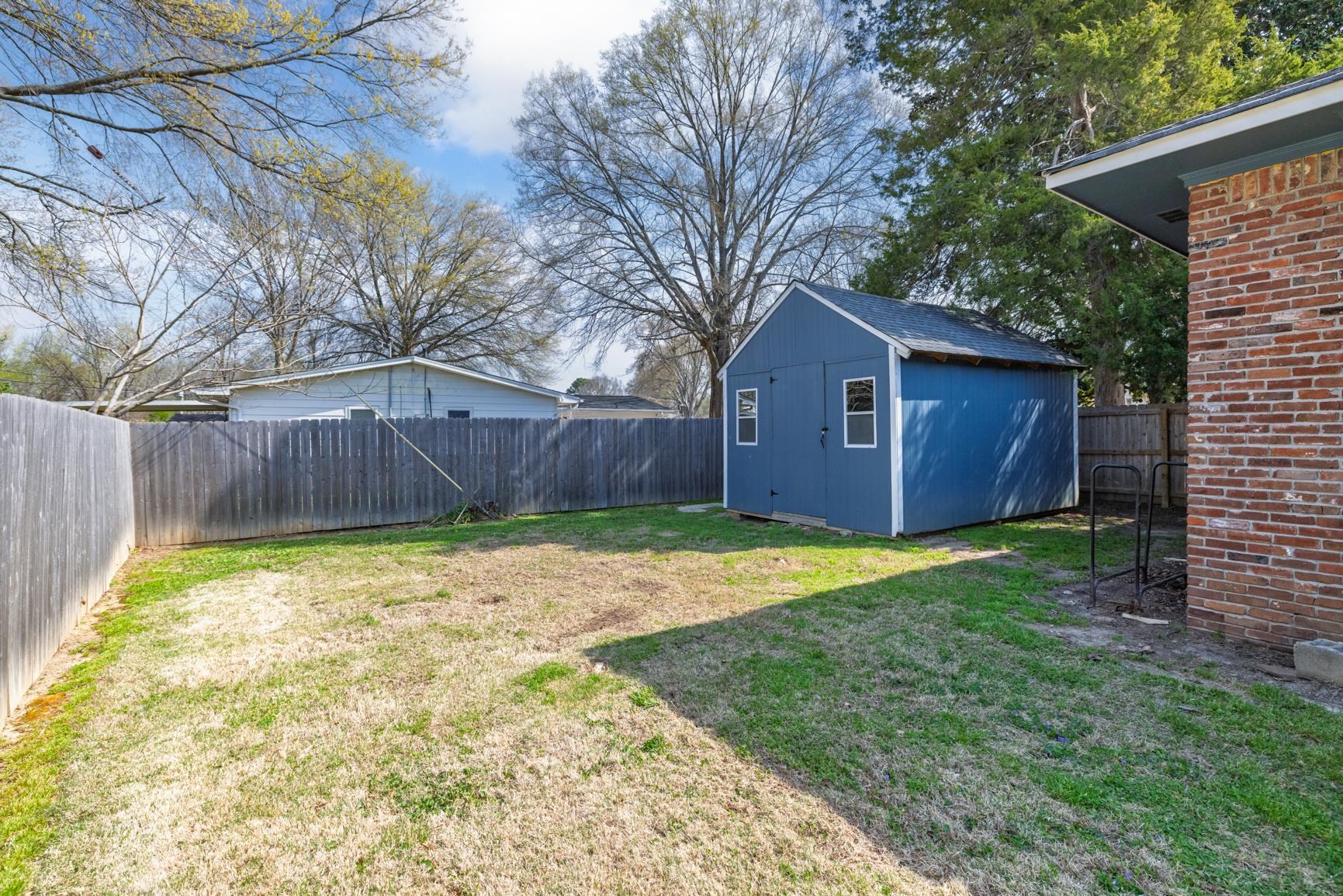 7223 Renda Street Millington, TN 38053 - Photo 23 of 24 a backyard of a house