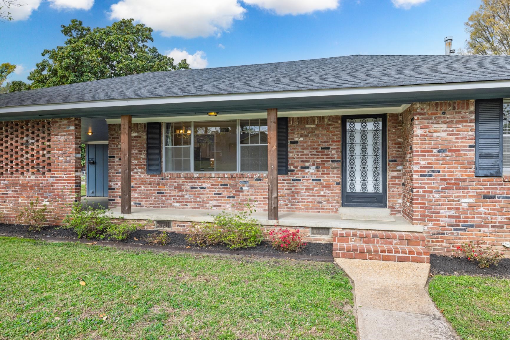 7223 Renda Street Millington, TN 38053 - Photo 4 of 24 front view of a house with a yard