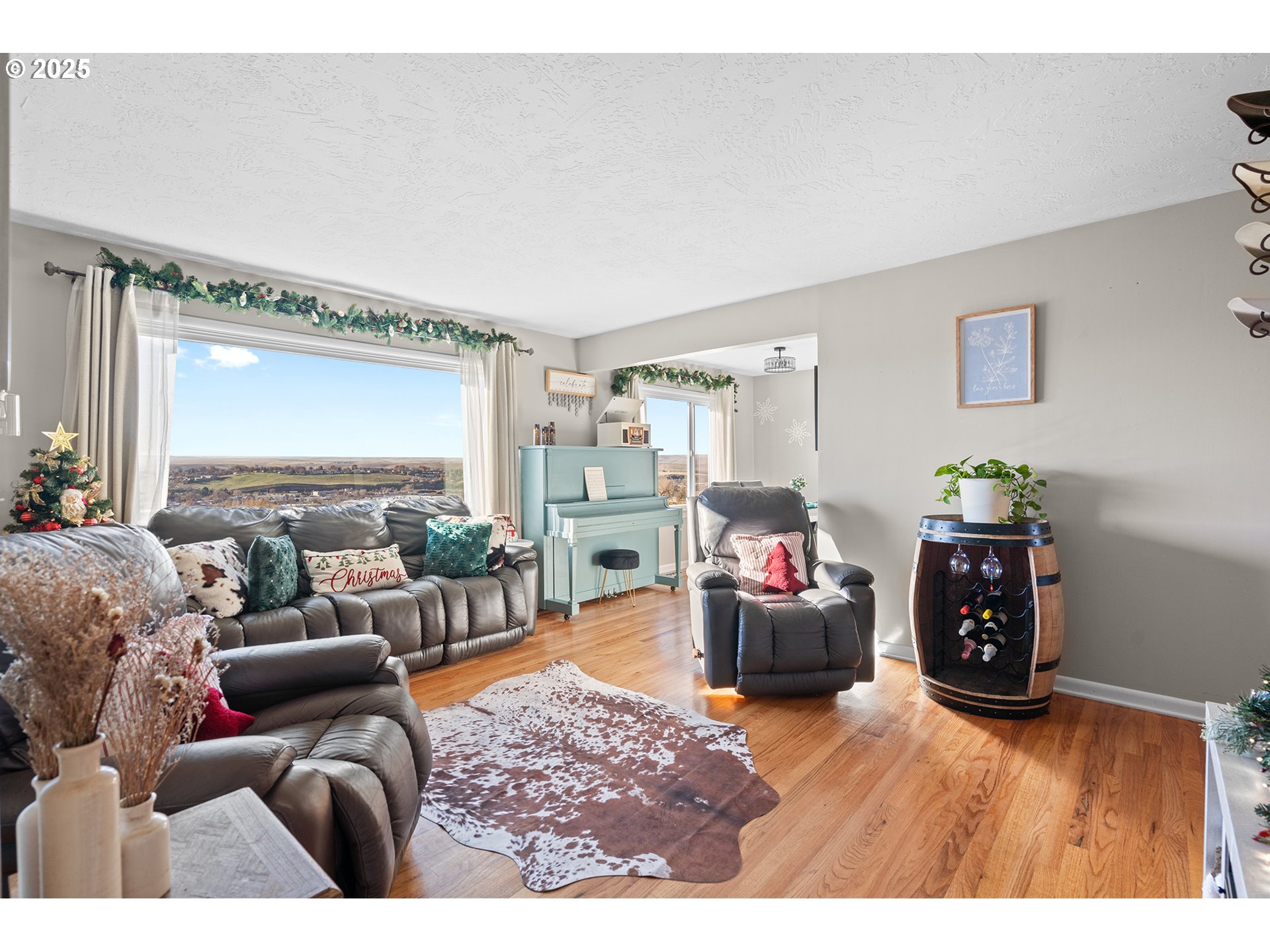 1214 Northwest Furnish Place Pendleton, OR 97801 - Photo 13 of 37 a living room with furniture and a wooden floor