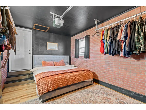 a bedroom with a bed and a walk in closet