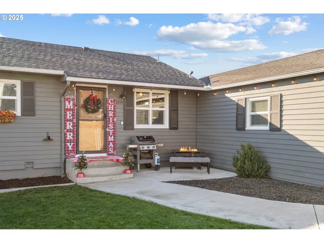 a backyard of a house with seating space