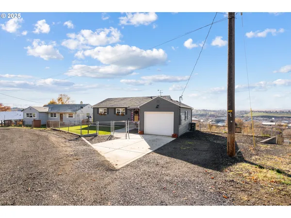 a view of a swimming pool with a lounge chairs