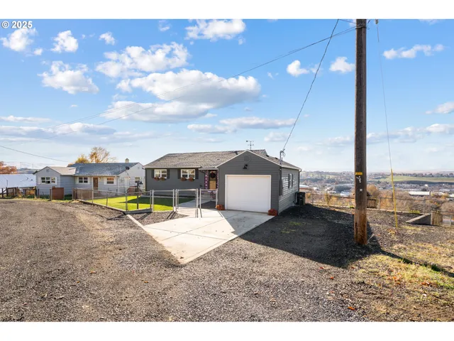 a view of a swimming pool with a lounge chairs