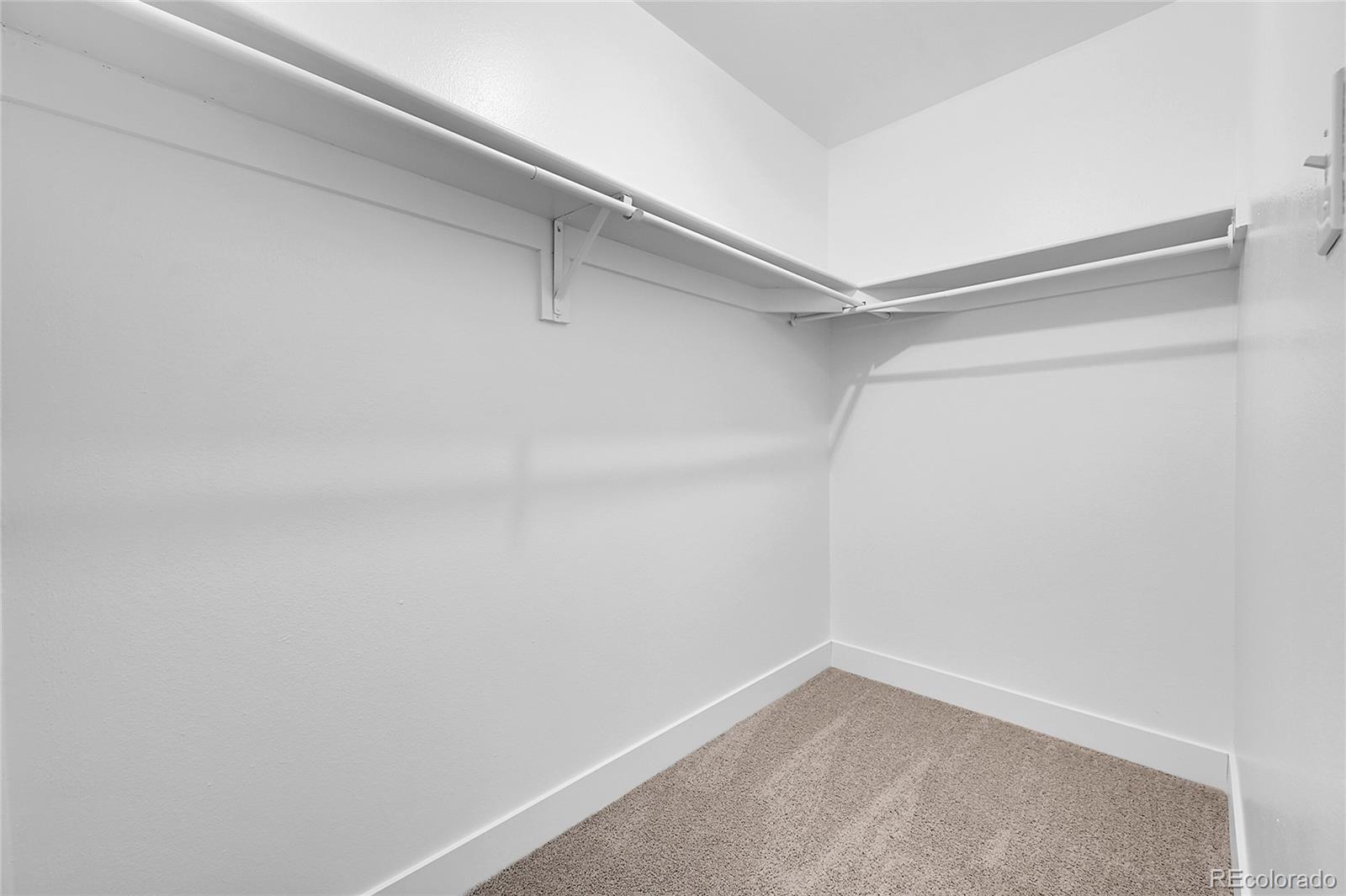 1344 Sable Boulevard Aurora, CO 80011 - Photo 23 of 31 a view of an empty walk in closet