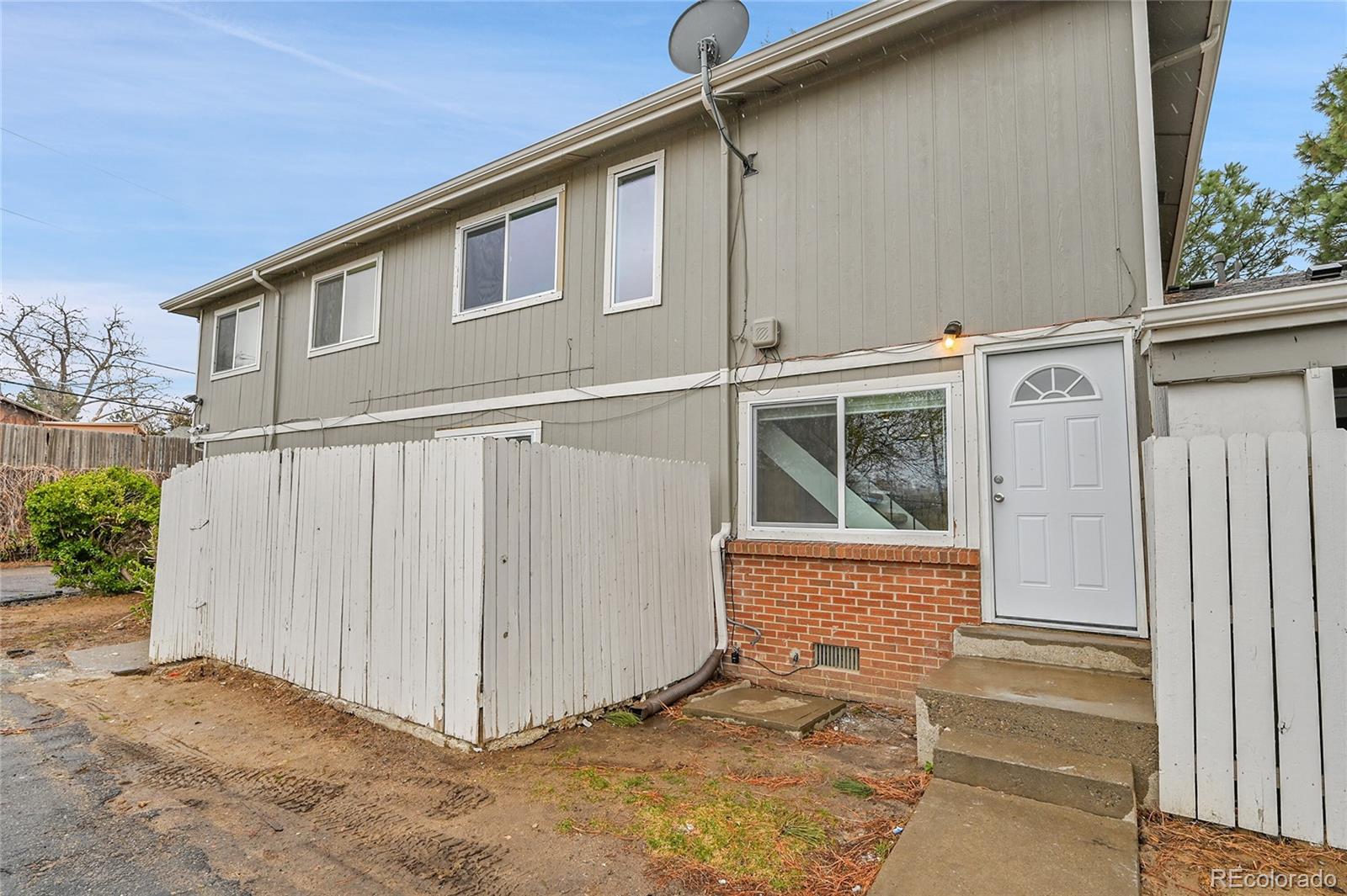 1344 Sable Boulevard Aurora, CO 80011 - Photo 27 of 31 a view of a house with backyard