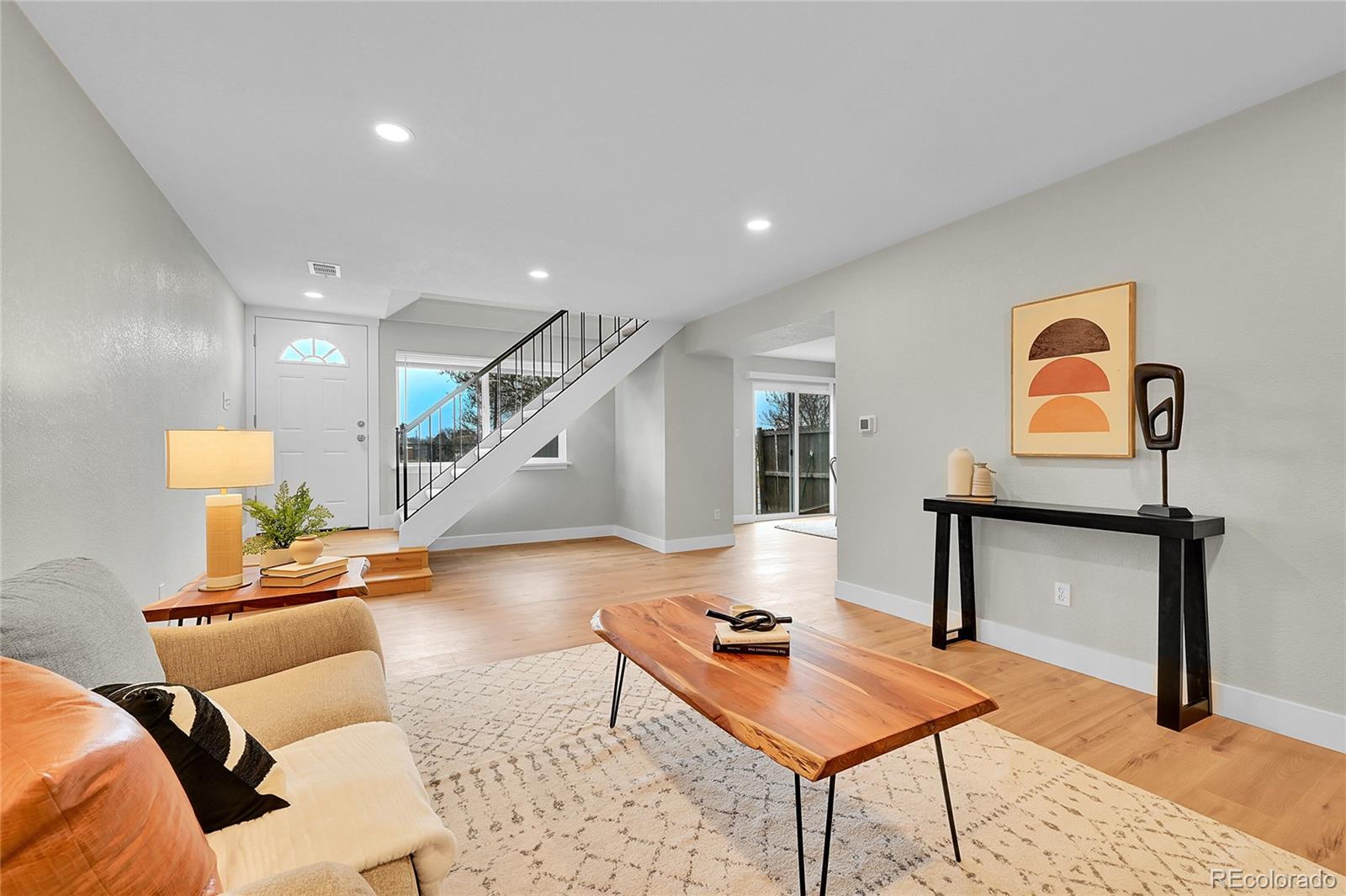 1344 Sable Boulevard Aurora, CO 80011 - Photo 8 of 31 a living room with furniture