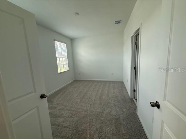 1913 Seawall Way Celebration, FL 34747 - Photo 17 of 34 a view of a room that has a window in it