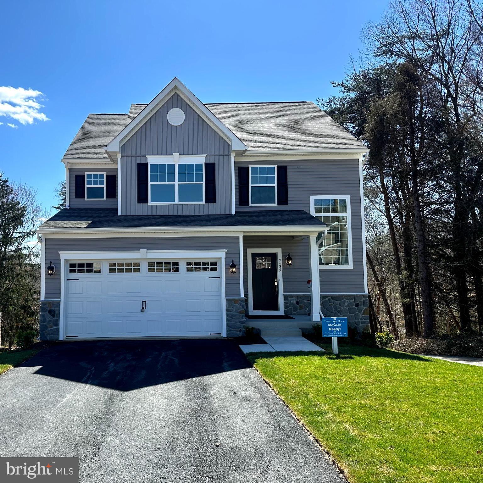 9425 Fairview Avenue Laurel, MD 20723 - Photo 1 of 125 a front view of a house with a yard and garage