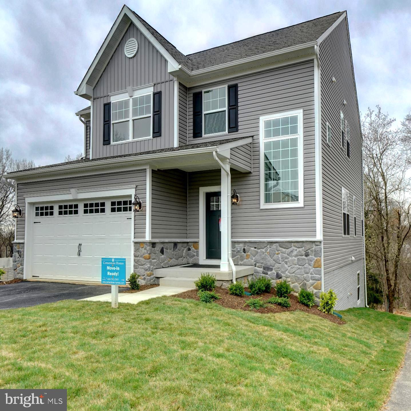 9425 Fairview Avenue Laurel, MD 20723 - Photo 3 of 125 a front view of a house with a yard