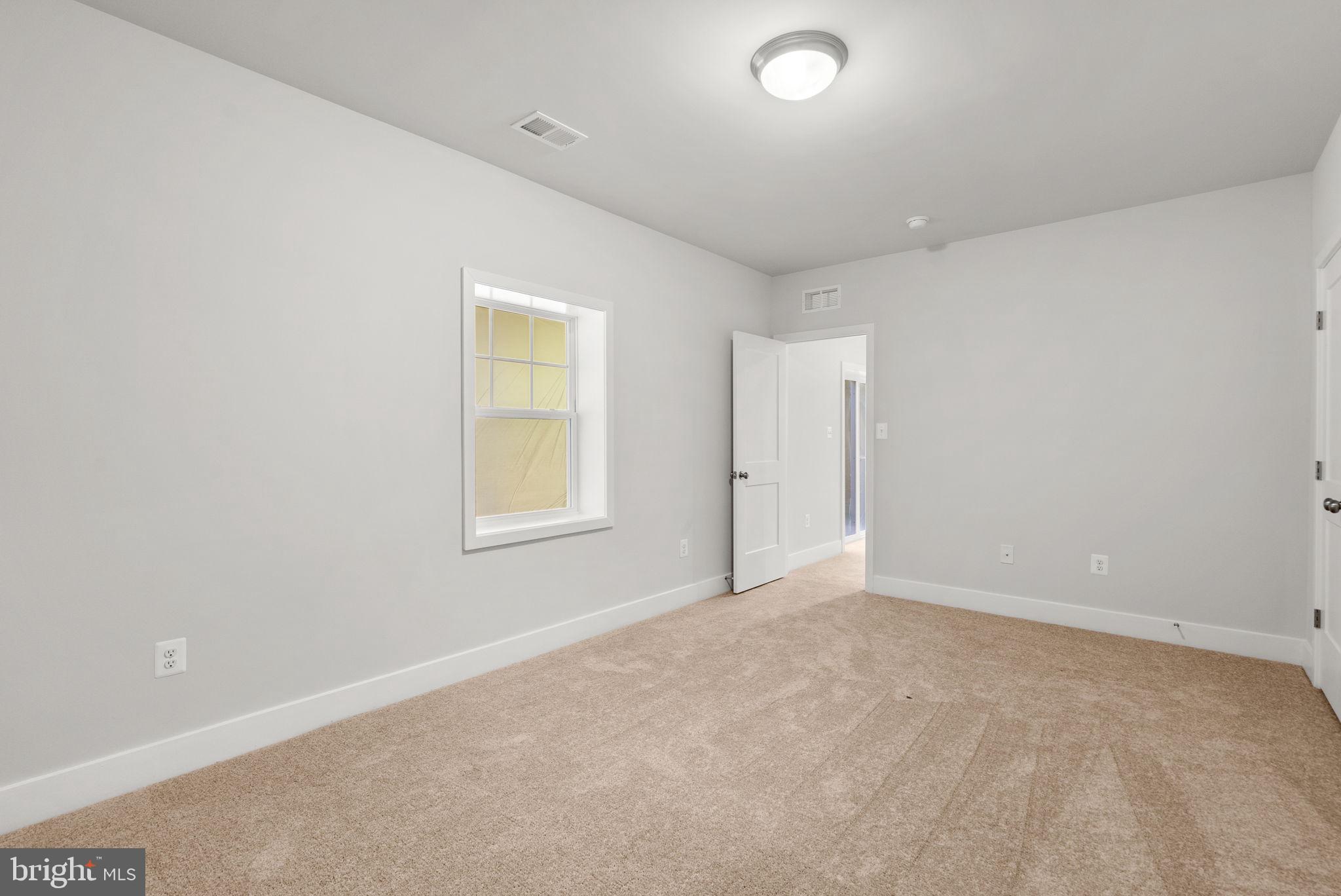 9425 Fairview Avenue Laurel, MD 20723 - Photo 46 of 125 a view of an empty room with a window