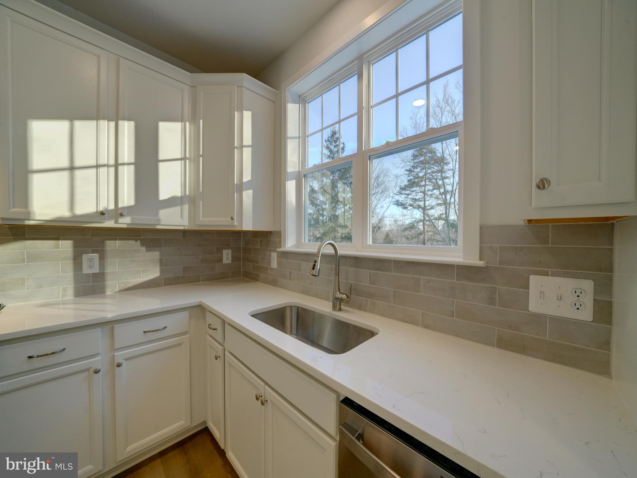 9425 Fairview Avenue Laurel, MD 20723 - Photo 70 of 125 a kitchen with a sink and cabinets