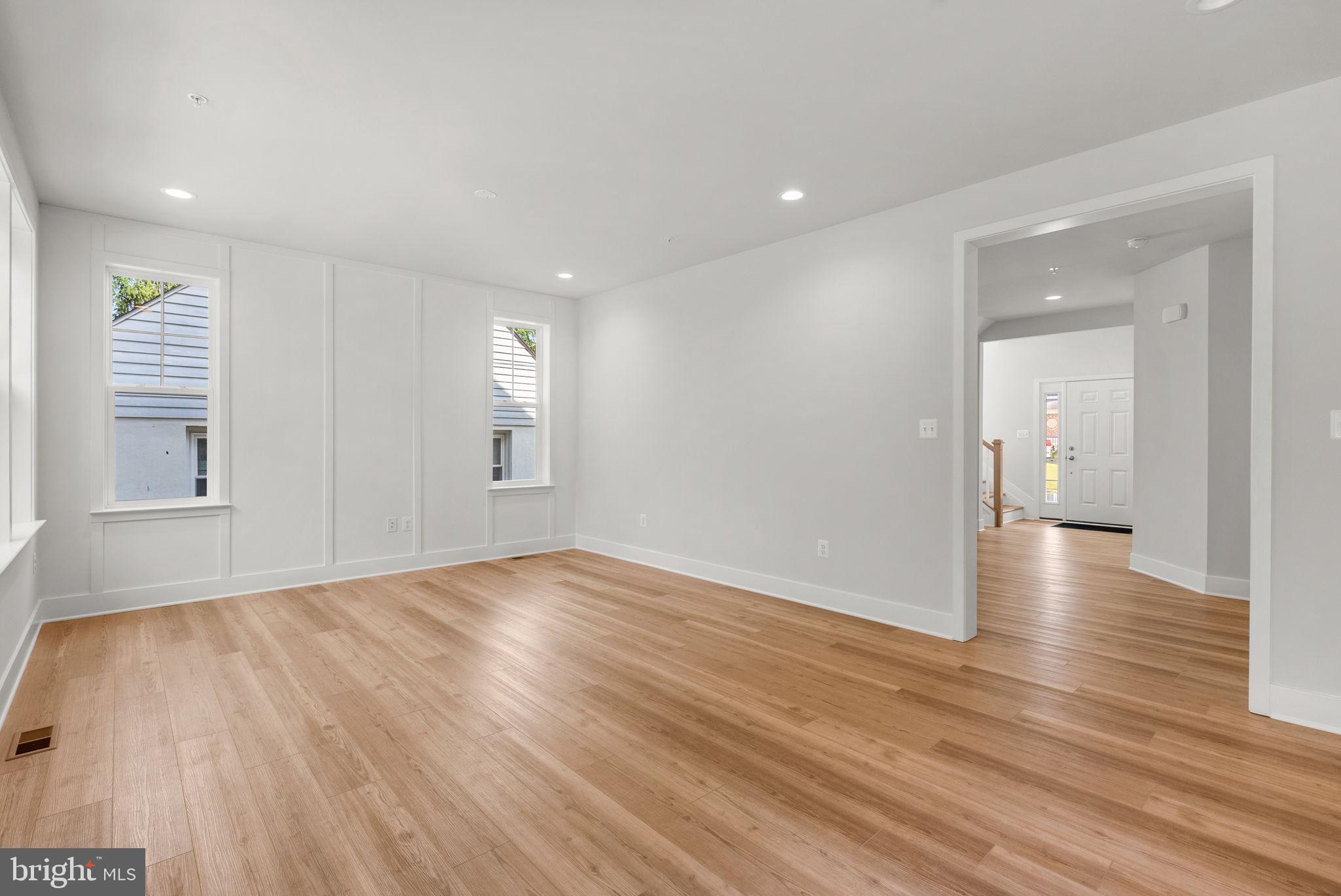 9425 Fairview Avenue Laurel, MD 20723 - Photo 10 of 125 wooden floor in an empty room with a window