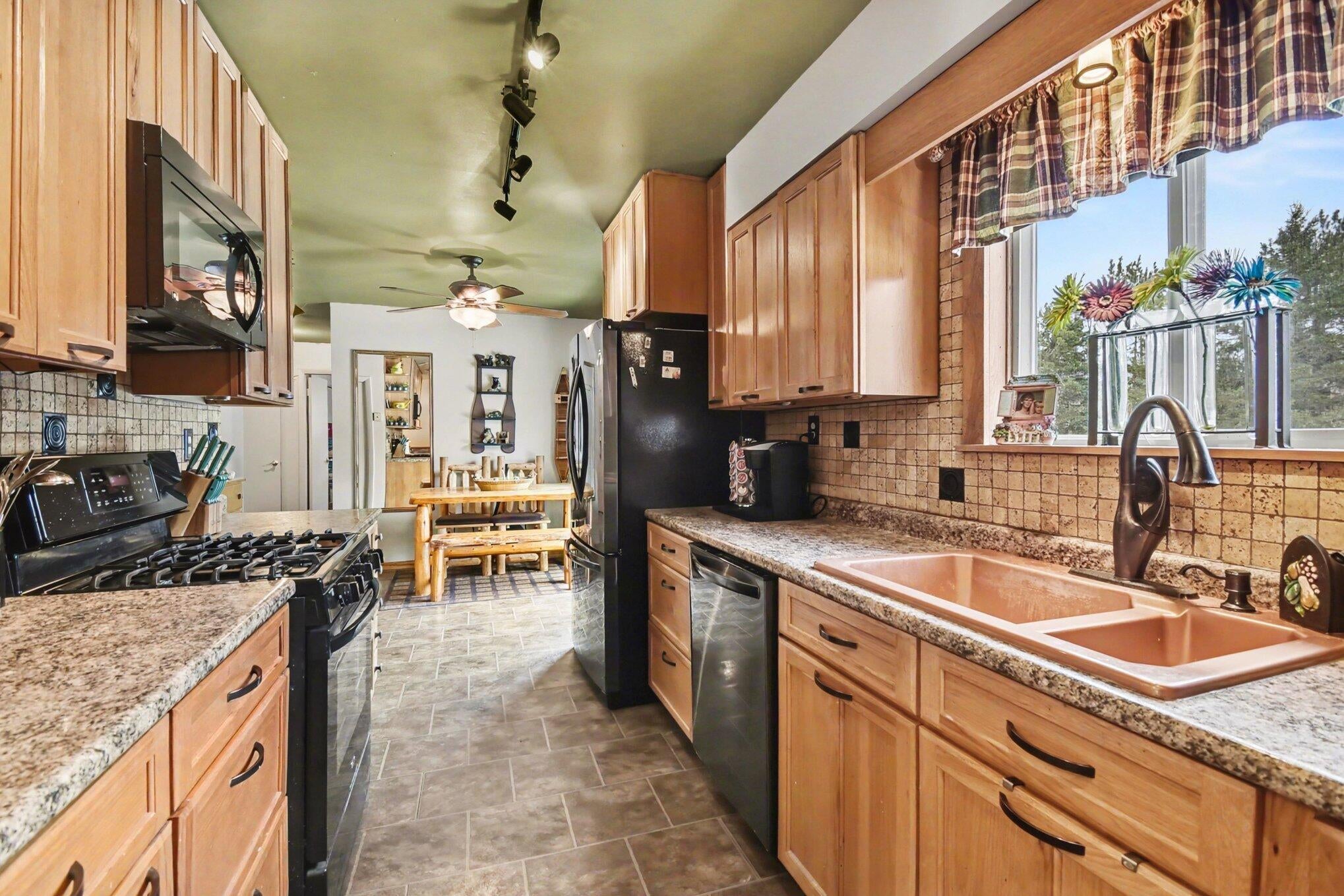 3821 Allis Road Gaylord, MI 49735 - Photo 2 of 25 Custom ceiling height maple cabinets