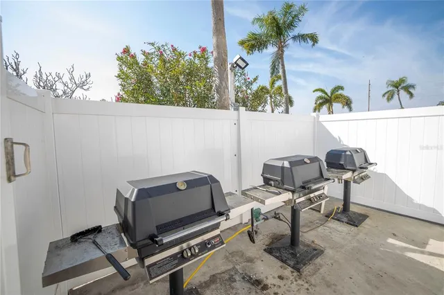 a view of walk in closet with white walls