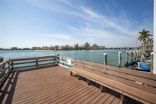 a kitchen with a sink cabinets and window