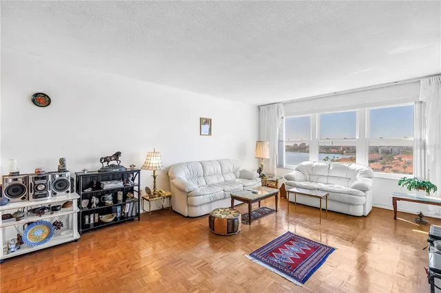 a bathroom with a toilet a sink and shower