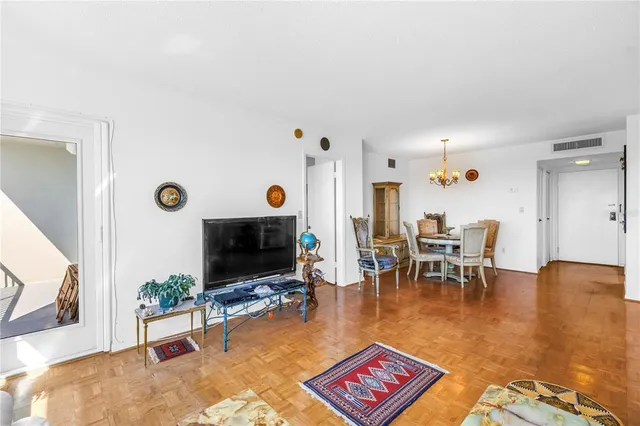 a living room with furniture and a table