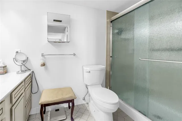 a view of dining room with a table and chairs
