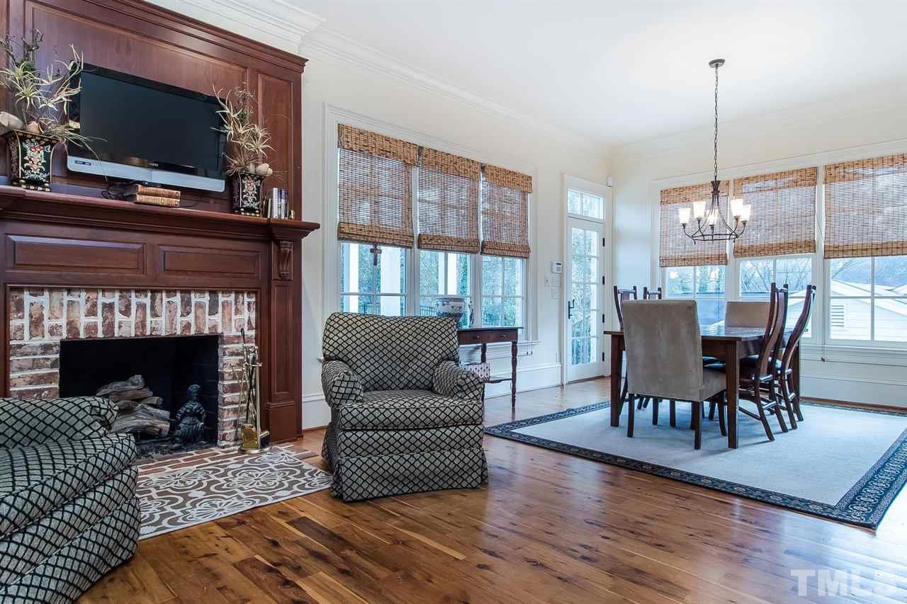 508 Marlowe Road Raleigh, NC 27609 - Photo 12 of 25 a living room with furniture fireplace and flat screen tv