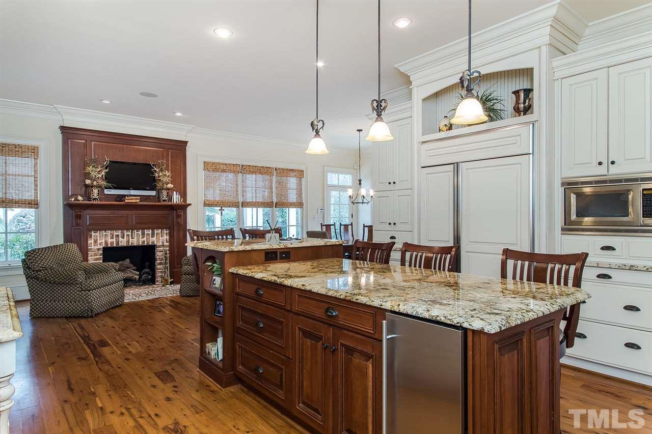 508 Marlowe Road Raleigh, NC 27609 - Photo 15 of 25 a kitchen with microwave a stove and a refrigerator