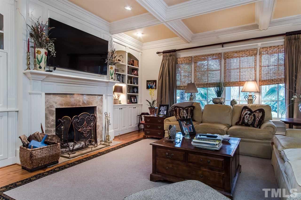 508 Marlowe Road Raleigh, NC 27609 - Photo 18 of 25 a living room with furniture fireplace and flat screen tv