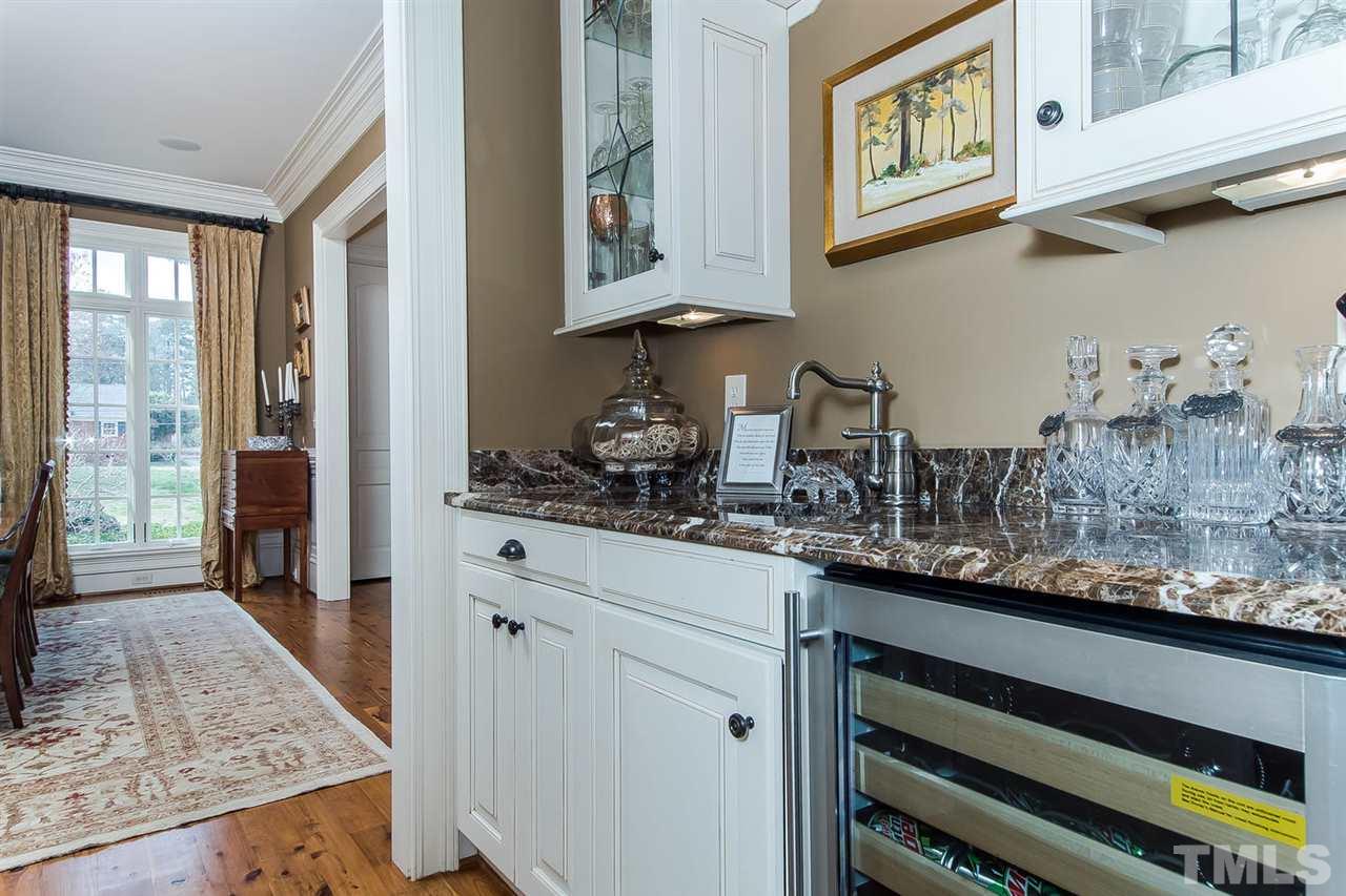 508 Marlowe Road Raleigh, NC 27609 - Photo 19 of 25 a kitchen with stainless steel appliances granite countertop a stove and cabinets