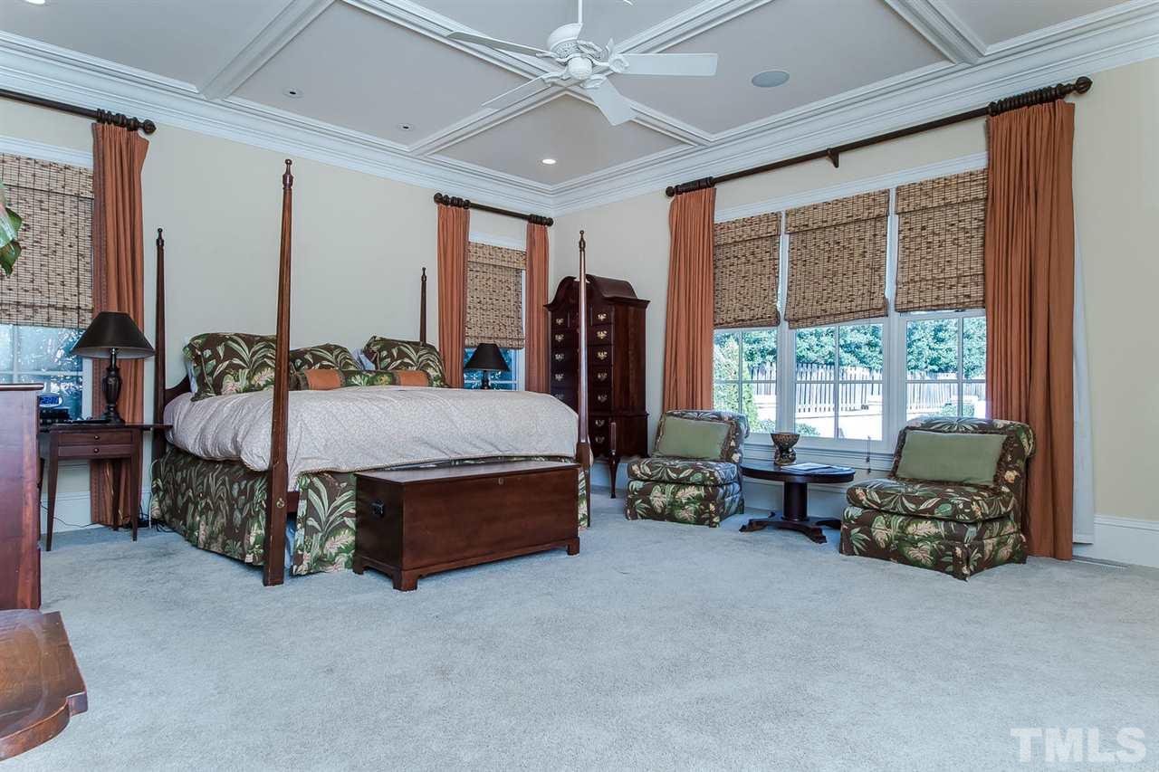 508 Marlowe Road Raleigh, NC 27609 - Photo 21 of 25 a bedroom with furniture and a large window