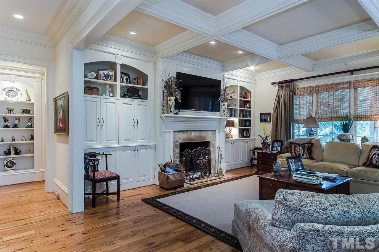508 Marlowe Road Raleigh, NC 27609 - Photo 9 of 25 a living room with furniture fireplace and flat screen tv