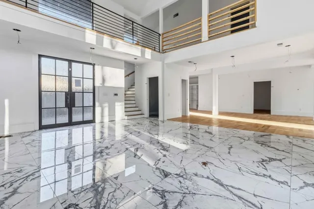 a view of empty room with windows