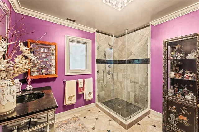 a bathroom with a bathtub shower sink and mirror