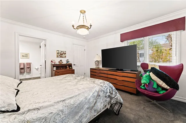 a bathroom with a granite countertop sink a mirror and a shower