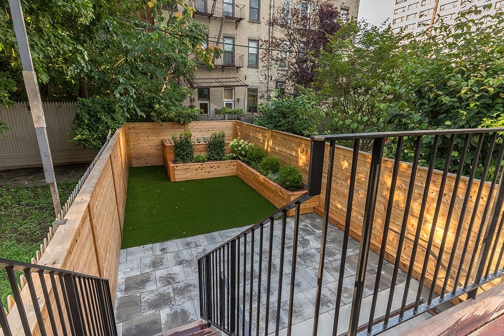 206 8th Street Hoboken, NJ 07030 - Photo 12 of 35 a view of a balcony with wooden floor and outdoor space