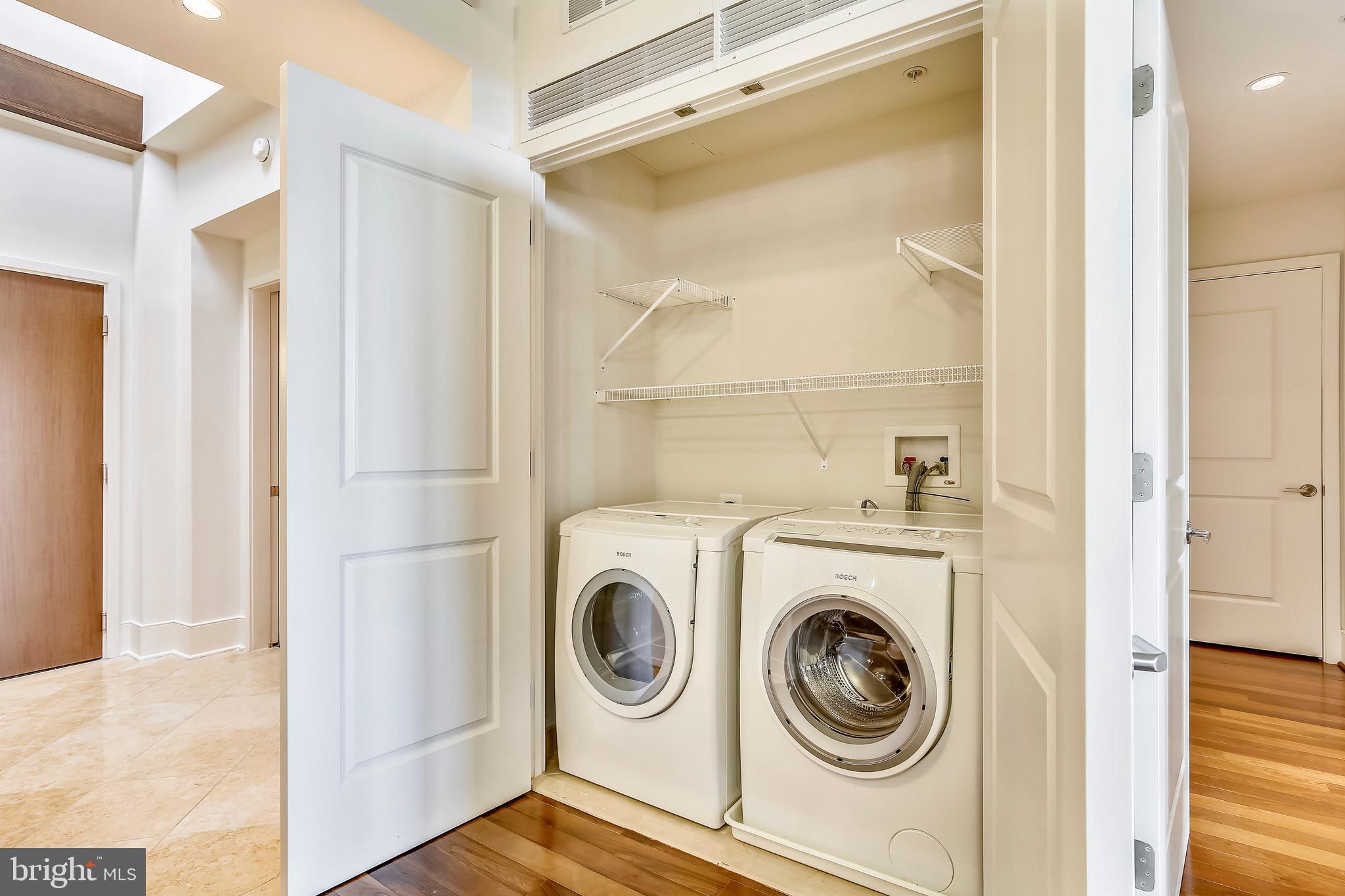 4301 Military Road Northwest, Unit PH5 Washington, DC 20015 - Photo 14 of 53 a utility room with dryer and washer