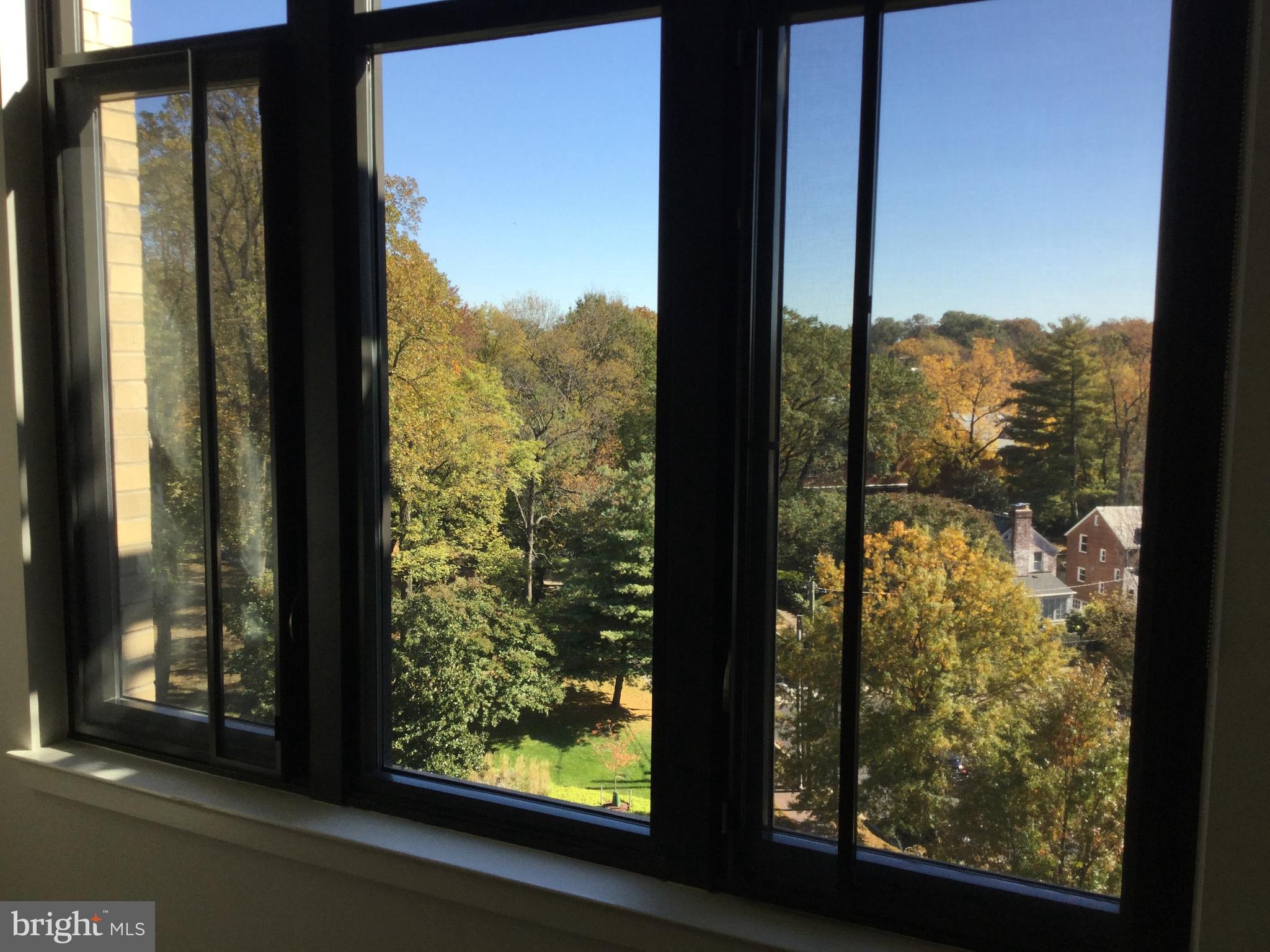 4301 Military Road Northwest, Unit PH5 Washington, DC 20015 - Photo 32 of 53 a view of a city from a window