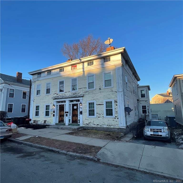 17 Franklin Street New London, CT 06320 - Photo 1 of 8 a front view of a building with street