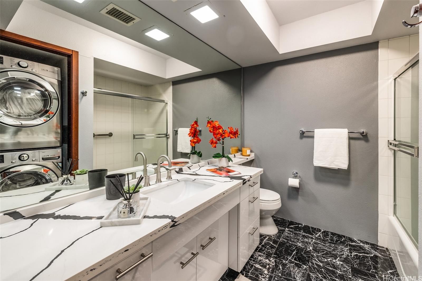 415 South Street, Unit 4202 Honolulu, HI 96813 - Photo 14 of 21 a bathroom with a sink mirror vanity and toilet