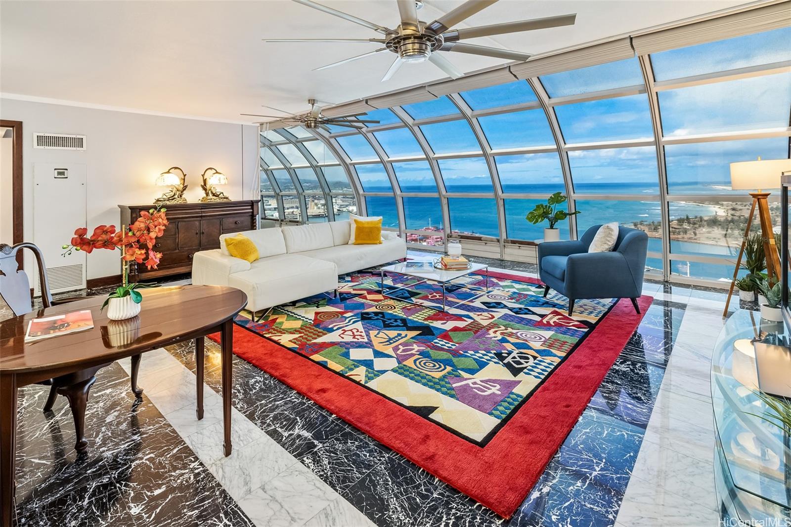 415 South Street, Unit 4202 Honolulu, HI 96813 - Photo 6 of 21 a living room with a rug and a table