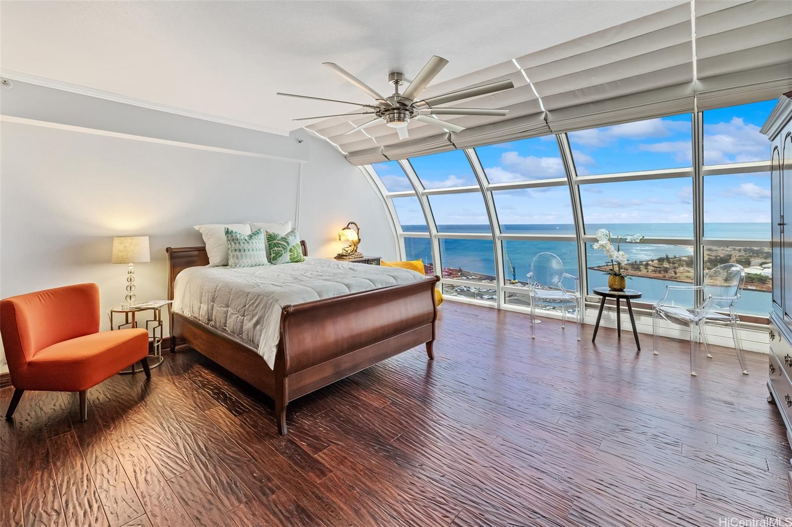 415 South Street, Unit 4202 Honolulu, HI 96813 - Photo 7 of 21 a bedroom with a bed a couch and a window