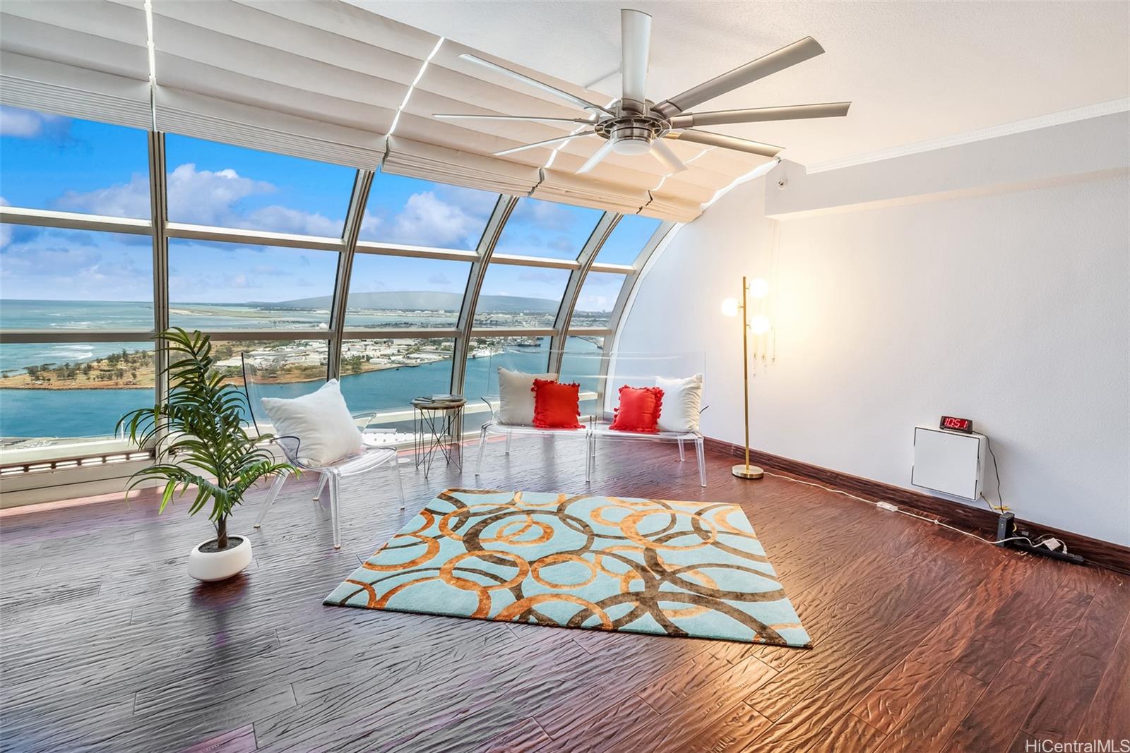 415 South Street, Unit 4202 Honolulu, HI 96813 - Photo 8 of 21 a living room with furniture and a wooden floor