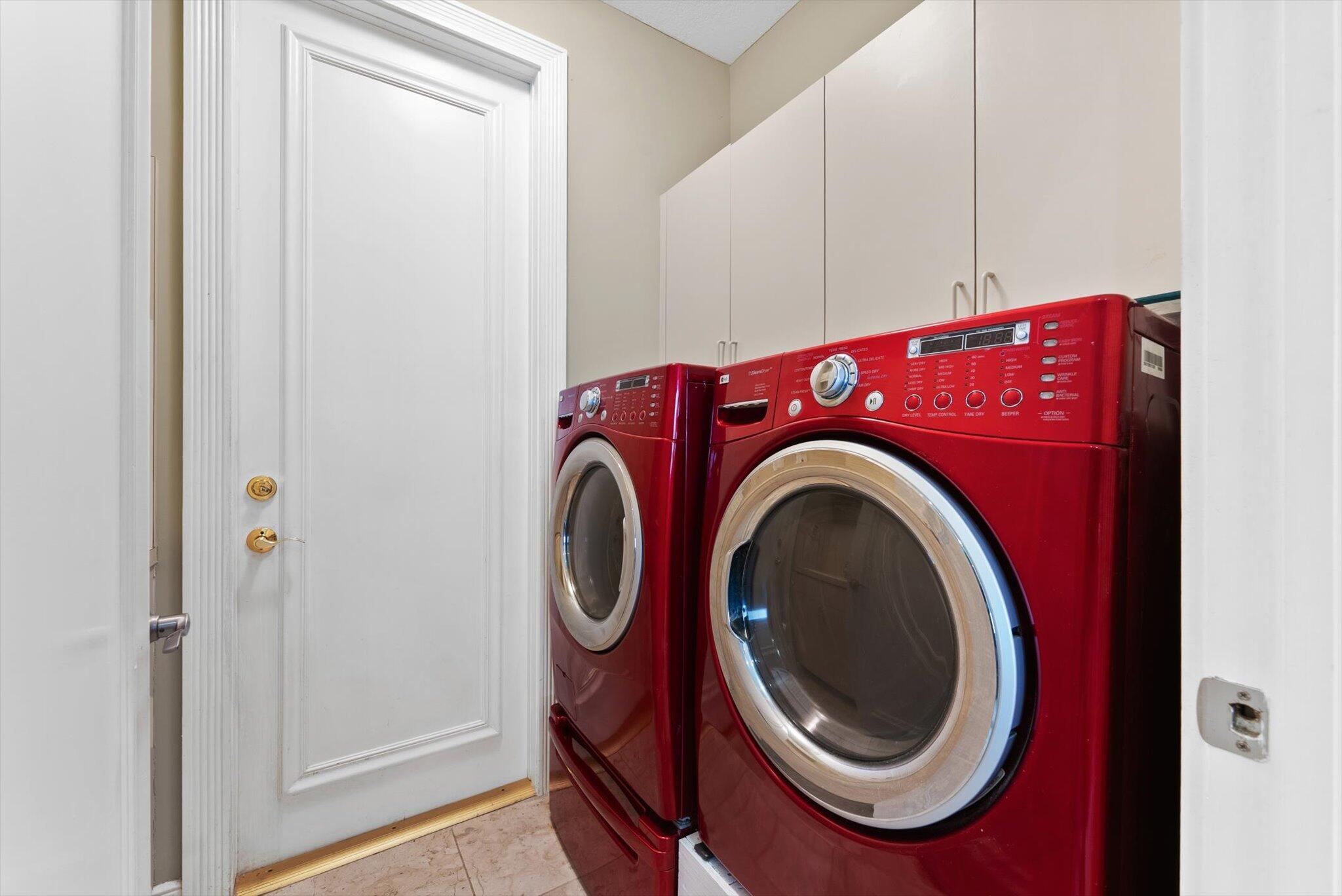 7081 Mallorca Crescent Boca Raton, FL 33433 - Photo 20 of 26 a utility room with dryer and washer
