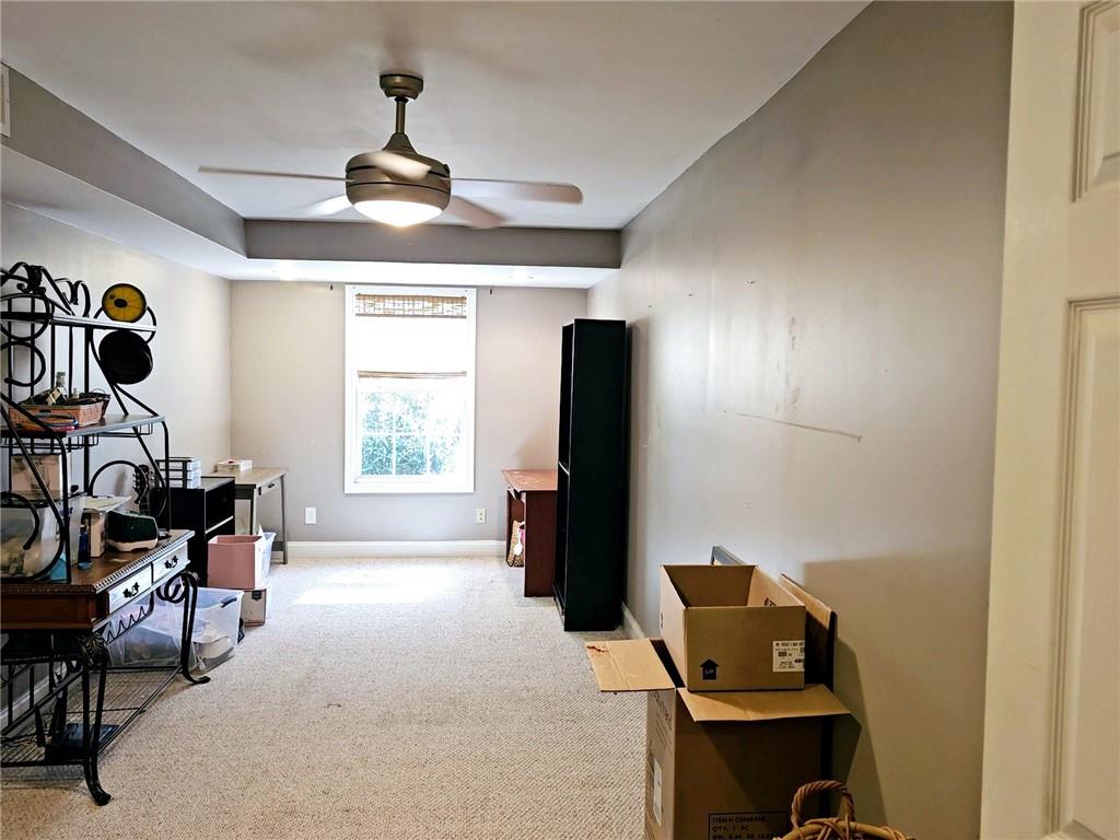 147 Crest Winds Drive Clarkesville, GA 30523 - Photo 14 of 17 a living room with furniture and a window